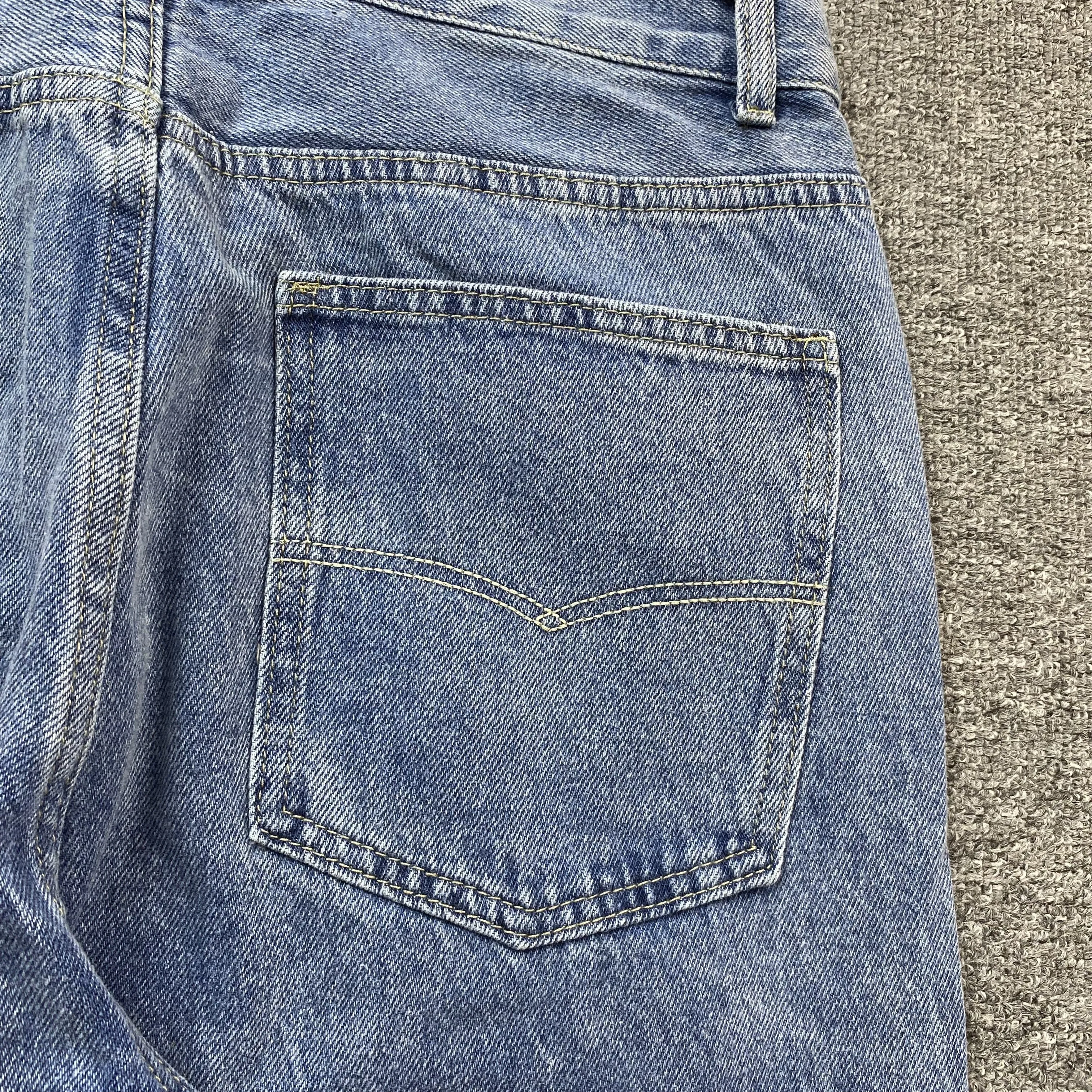 DENIM TEARS x OFFSET JEANS LIGHT WASH